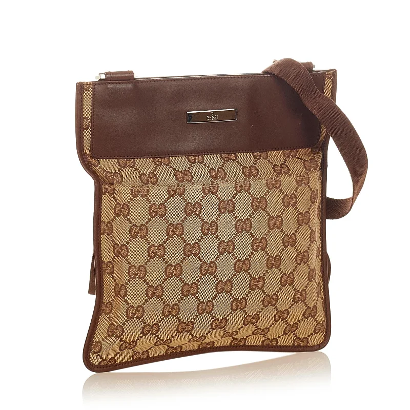 Women Gucci Sylvie bags with a monogram - embossed leatherGucci GG Canvas Crossbody Bag (25766)