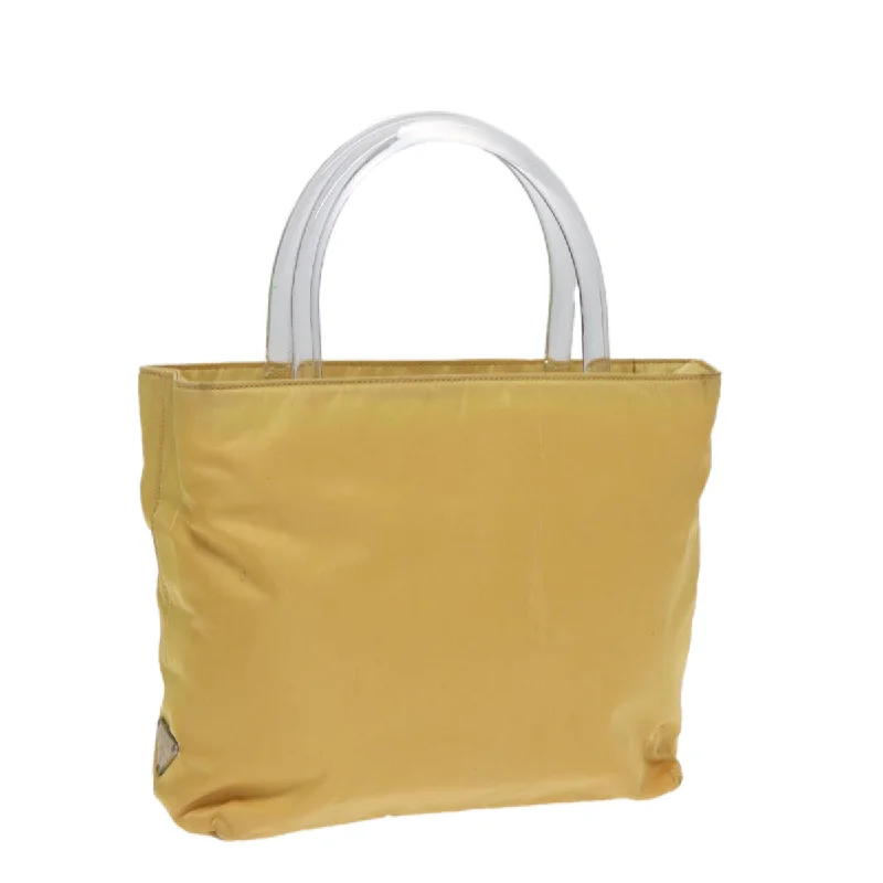 Prada bags with a snap - button closure and a decorative charm for a fashionable lookPRADA Hand Bag Nylon Yellow Silver Auth bs17343