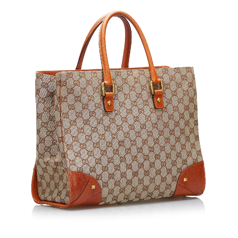 Gucci tote bags for women with a spacious interiorGucci GG Canvas Nailhead Tote (SHG-ThiuAq)