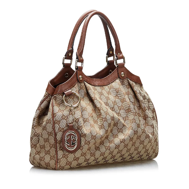 Women Gucci bags with a magnetic snap closure for easy accessGucci GG Canvas Sukey (SHG-wPrZKd)