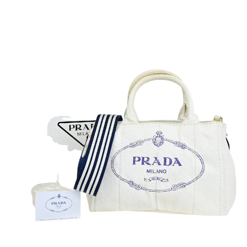 Prada tote bags with a spacious interior and a magnetic - snap closurePRADA Canapa Handbag