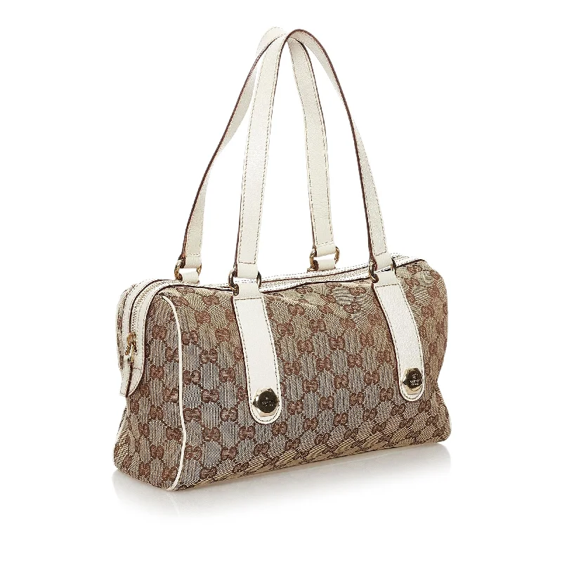 Women Gucci bags with a zip - around closure for securityGucci GG Canvas Charmy Handbag (31766)