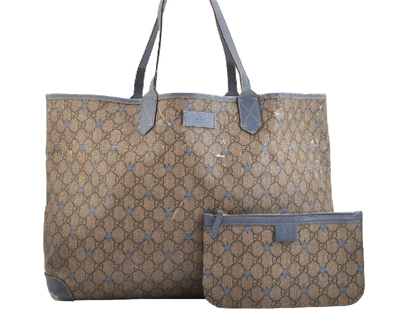 Women Gucci backpacks with a luxurious leather finishAuthentic GUCCI GG Supreme Stars Tote Bag GG PVC Leather 309497 Brown Blue 9102J