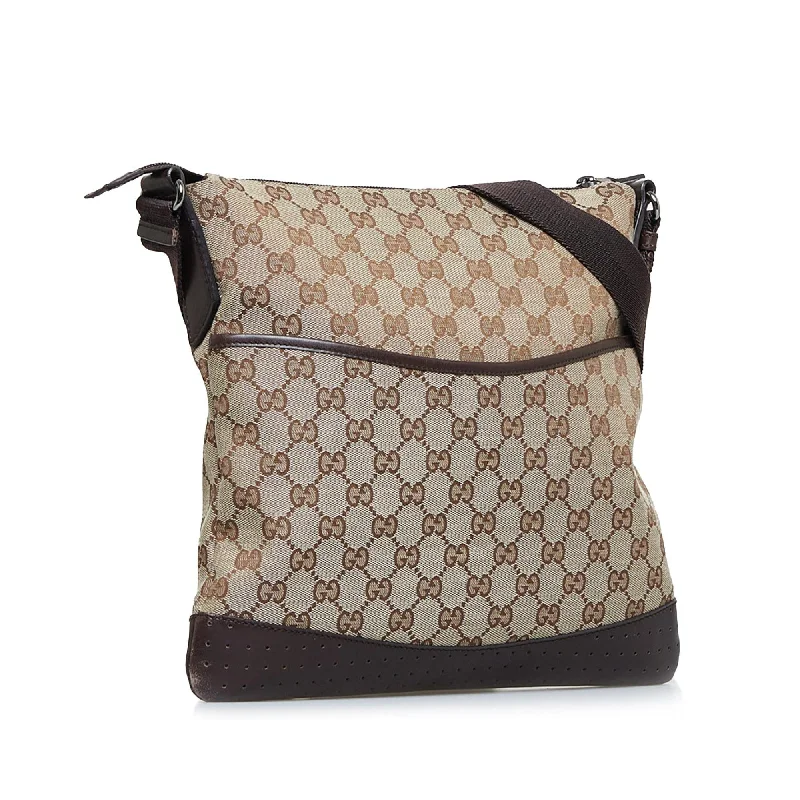 Women Gucci Sylvie bags with a monogram - embossed leatherGucci GG Canvas Crossbody (87k0HK)