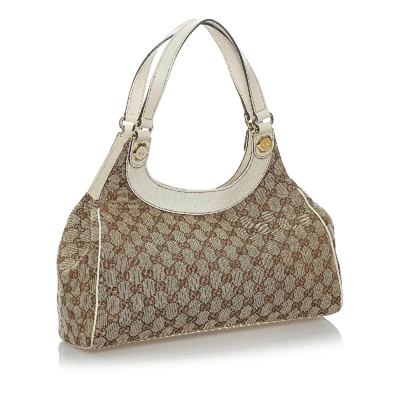 Women Gucci Sylvie bags with a monogram - embossed leatherGucci GG Canvas Charmy Shoulder Bag (30421)