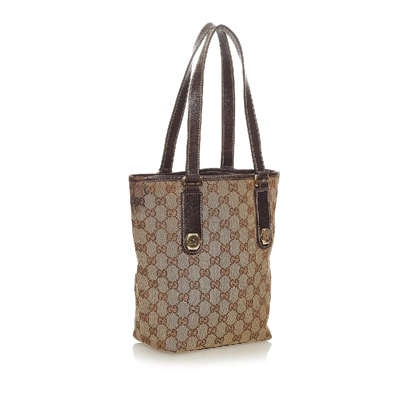 Gucci Marmont bags for women with gold - toned hardwareGucci GG Canvas Charmy Tote Bag (27678)