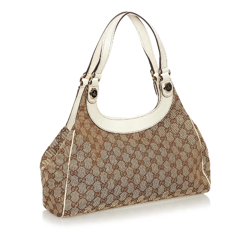 Gucci tote bags for women with a printed Gucci logoGucci GG Canvas Charmy Shoulder Bag (33687)