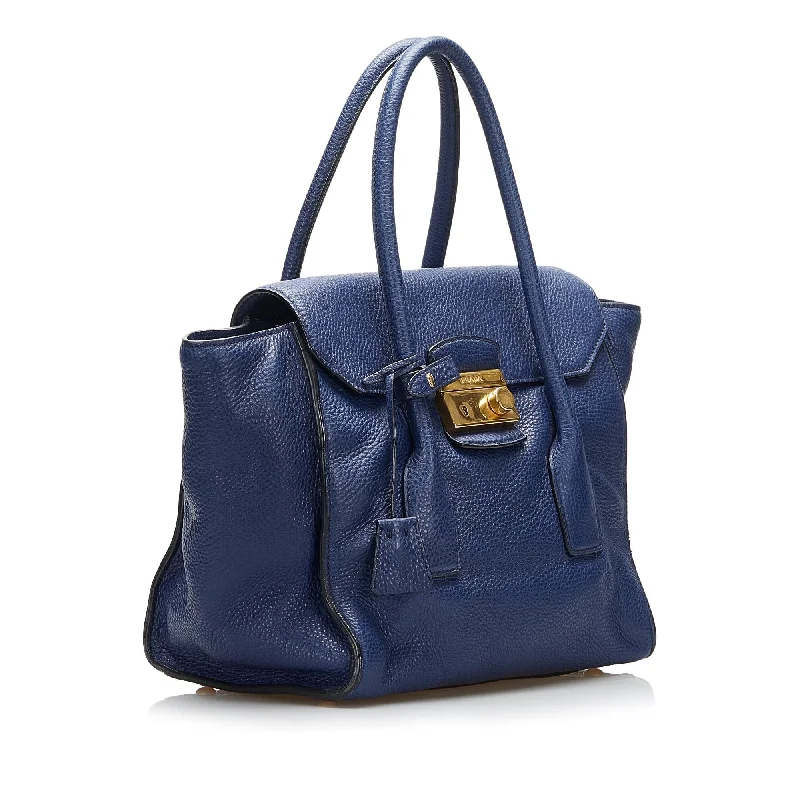 Prada tote bags with a water - resistant coating for outdoor activitiesPrada Vitello Daino Sound Lock Satchel (SHG-GPwQEl)