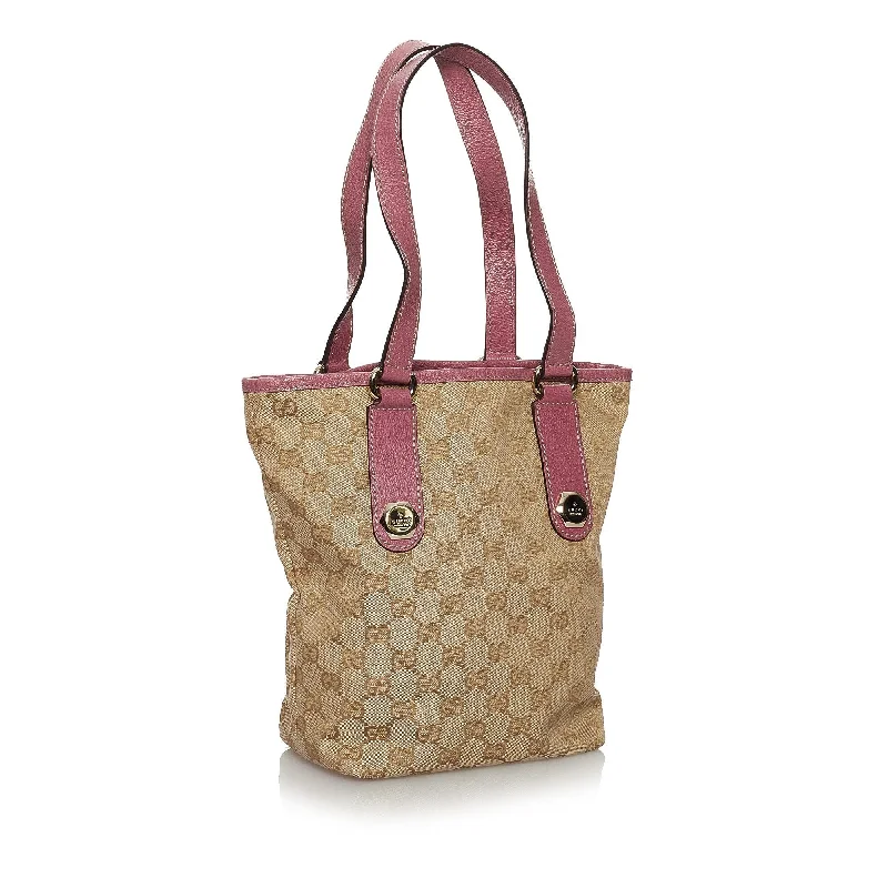 Ladies Gucci Dionysus bags in a pastel colorGucci GG Canvas Charmy Tote Bag (30646)