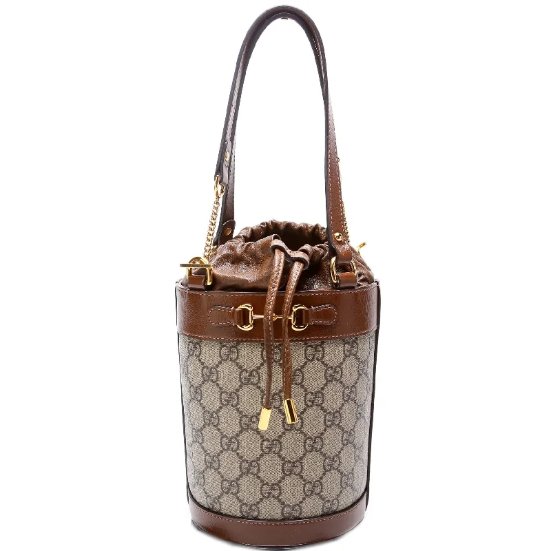 Gucci Marmont bags for women with a contrast - colored interiorHorsebit 1955 Gucci Supreme Small Bucket Bag 637115