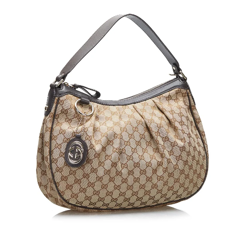 Women Gucci Sylvie bags with a crystal - embellished web stripeGucci GG Canvas Sukey Shoulder Bag (SHG-PeWYIq)