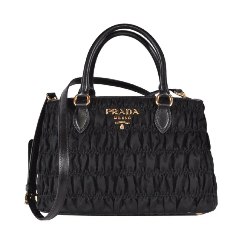 Ladies Prada handbags with a detachable wallet inside for added conveniencePrada Tessuto Gaufre Nylon Small Black Satchel Handbag