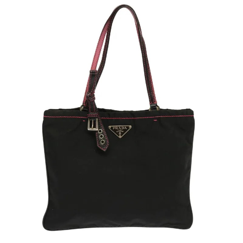 Prada Cleo bags with a contrast - colored interior for visual interestPRADA Tessuto Handbag