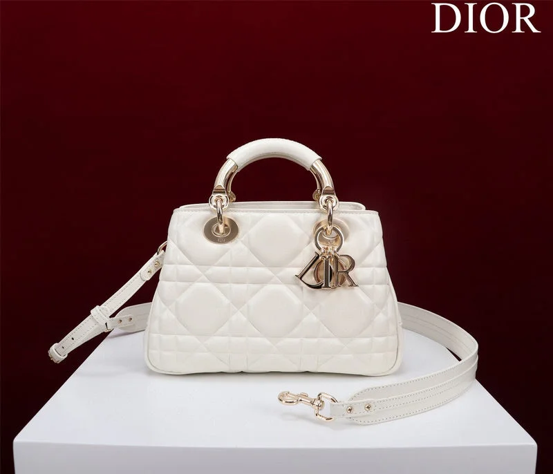 Christian Dior handbags with a snap - button closure and a decorative buckleDior Bag