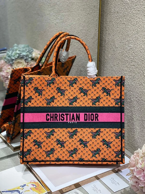 Christian Dior handbags with a snap - button closure and a decorative buckleChristian Dior Large Book Tote Orange Multicolor,