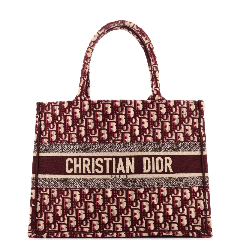 Christian Dior Saddle bags with a patent leather finish for a shiny lookBook Tote Oblique Canvas Medium