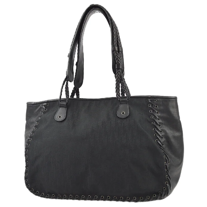 Christian Dior Saddle bags with a studded trim for a bold lookChristian Dior Black Ethnic Trotter Handbag